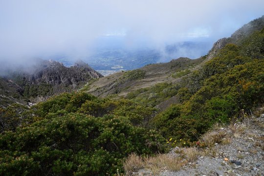 A view from the top of Baru Volcano, Panama to the valley with white fog in the distance