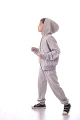 the boy in a sports suit goes