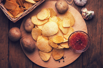 Crispy potato chips, potato and sauce 