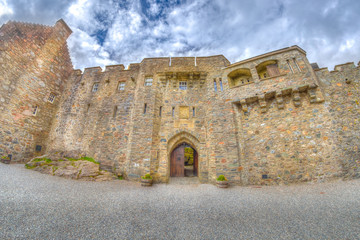 doorway of the Eilean Donan Castle from the internal yard on side entrance in Dornie town, Scotland, United Kingdom