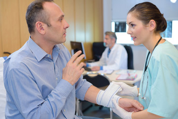 medical assistant entertaining a patient