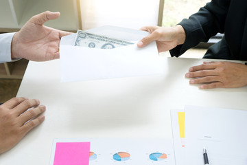 Business man give bribe to the