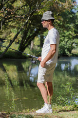 Fototapeta na wymiar man fishing at the lake