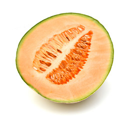 A half of cantaloupe melon on white background