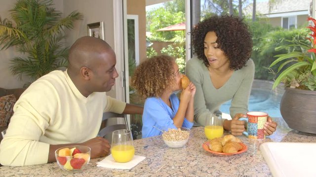 African American family  eating breakfast