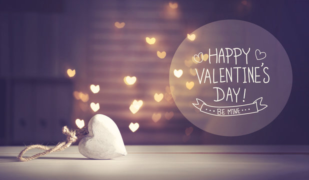 Happy Valentine's Day message with a white heart with heart shaped lights