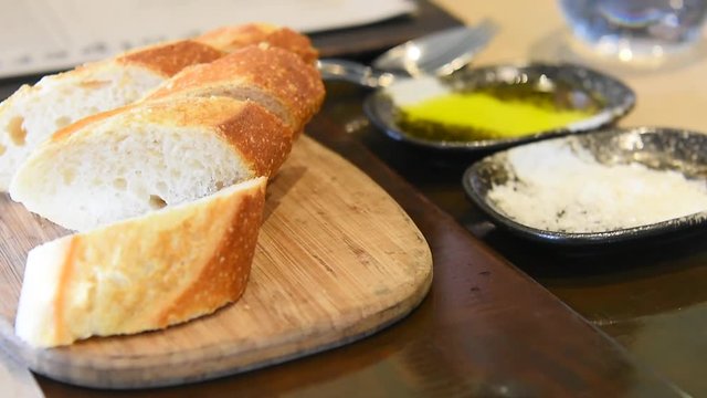 sliced baguette with olive oil and rock salt