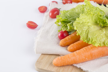 Obraz na płótnie Canvas Healthy eating, fresh vegetables on a wooden table.