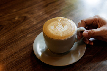 Cups of coffee on rustic wooden table background. Coffee Break Recreation Relaxation Concept. Selective focus.
