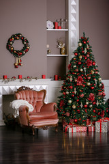 Image of chimney and decorated Christmas tree with gift