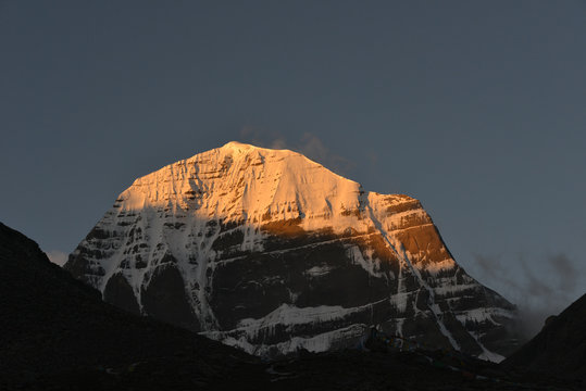 North Face of Mount Kailash with sun rays on the peak