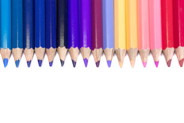 Colorful Pencils Positioned in Order on Pure White Background