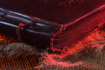 Area, the cover of the album. Old photo album. The texture of the fabric. Rough cloth Old cloth. Backgrounds for creativity.Torn fabric. The shade of red.