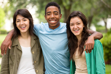 Diverse group of friends talking and laughing.