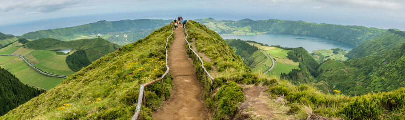 Trek towards the Miradouro da Boca do Inferno overlooking Sete Cidades on the island of Sao Miguel in the Azores, Portugal - 184883849