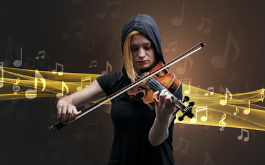 Musician playing on violin with notes around