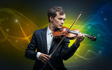 Fototapeta premium Violinist with colorful fabled concept
