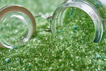close up magnesium fertilizer in glass bottles .blur background