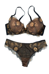 Black with beige lace set of female underwear. Isolate