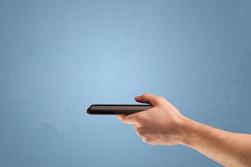 Holding telephone device from profile