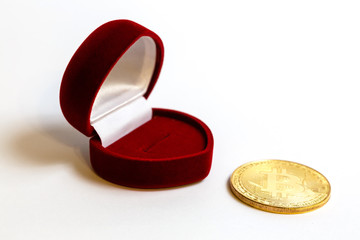 Coin bitcoin in a gift box for a ring or jewelry the concept of crypto currency the best gift 