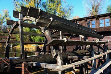 Detail of broad wooden watermill wheel on ship mill in Kollarovo, Slovakia