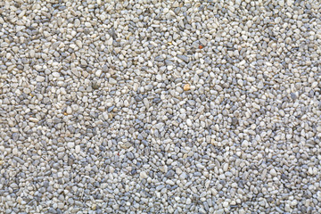 Background of smooth pebbles on the beach