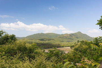 Fototapeta na wymiar Nature of Hainan Island with mountains and tropical plants