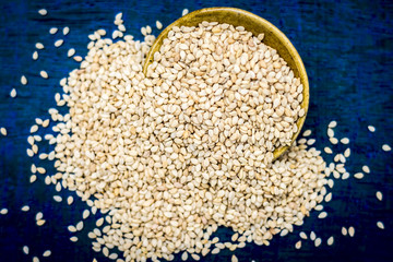 Close up of sesame seeds,Sesamum indicum in traditional basket.