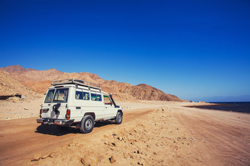 Fototapeta na wymiar Jeep off road in a mountain desert