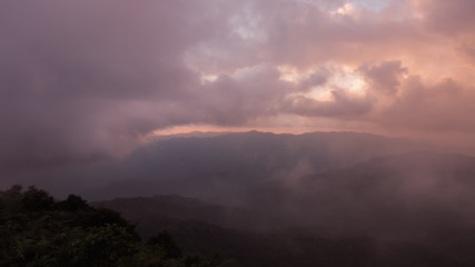 Fototapeta na wymiar Beautiful Natural Sunset Sunrise Over Khao Mokoju Summit Mokoju Mountain, Mae Wong National Park, Thailand.