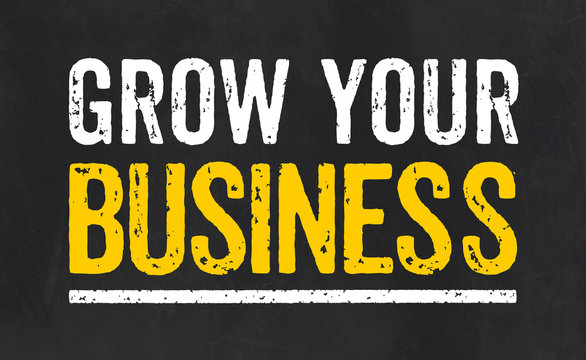 Blackboard with the text Grow your business