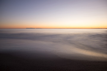 Fototapeta na wymiar The coast of Benicasim at sunrise, Castellon