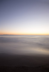 Fototapeta na wymiar The coast of Benicasim at sunrise, Castellon
