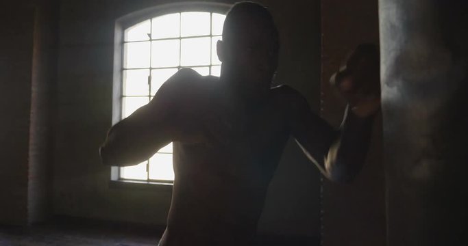  00:14 | 00:17 1&times;  A muscular and sweaty man is training at the gym by lifting the gym weights to strengthen his muscles. Concept of: workout, workout, power, supplements, fitness