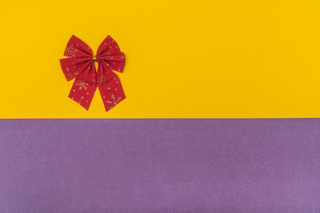red bow on a colored background