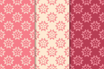 Set of red floral ornaments. Cherry pink vertical seamless patterns