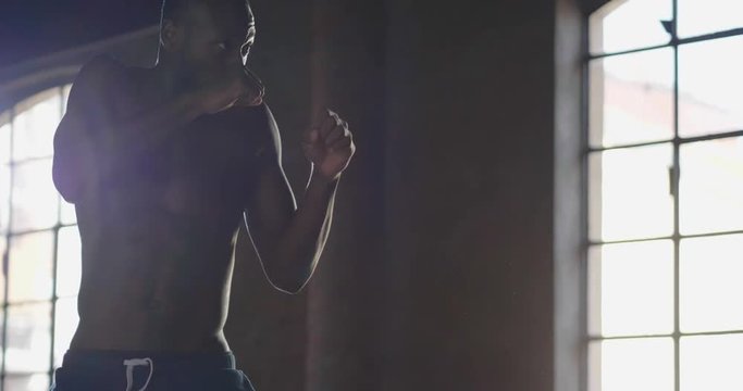  00:14 | 00:17 1&times;  A muscular and sweaty man is training at the gym by lifting the gym weights to strengthen his muscles. Concept of: workout, workout, power, supplements, fitness