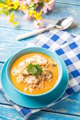 Tomato soup with rice.