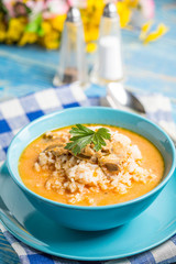 Tomato soup with rice.