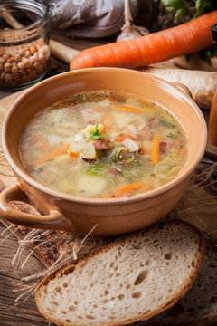 Pea soup with vegetables and bacon.