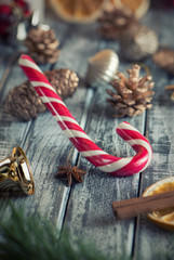 Close view Christmas candy on wooden rustic background with christmas decoration