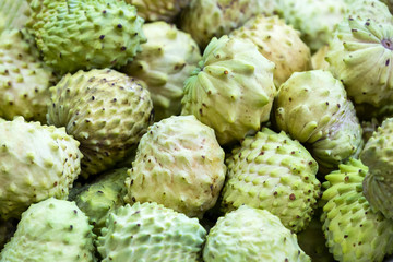 Obraz premium Guanabana ripe juicy fruit close-up background