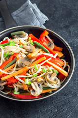 Stir fry with udon noodles and vegetables