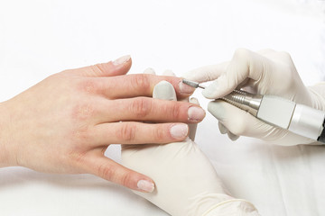 The process of the master's work in the manicure salon of female nails