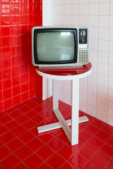 old television on wooden chair