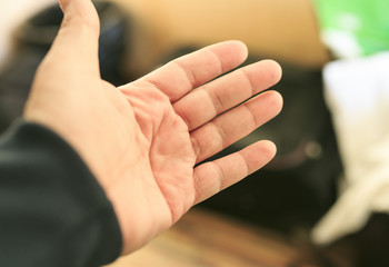 Naklejka premium Hand waiting other hand to salute
