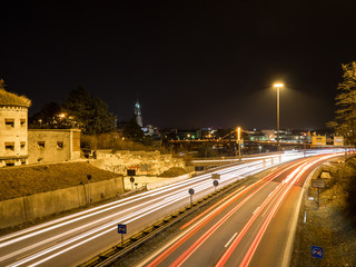 Naklejka na ściany i meble car traffic at night in ulm, germany