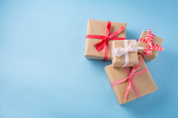 Christmas present boxes on a light blue background