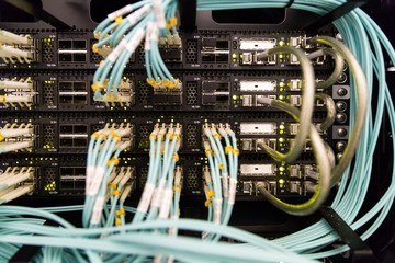 Severs computer in a rack at the large data center. Rack Mounted Servers. The image has a little...